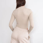 Tan High Neck Bodysuit With Cut Out Design