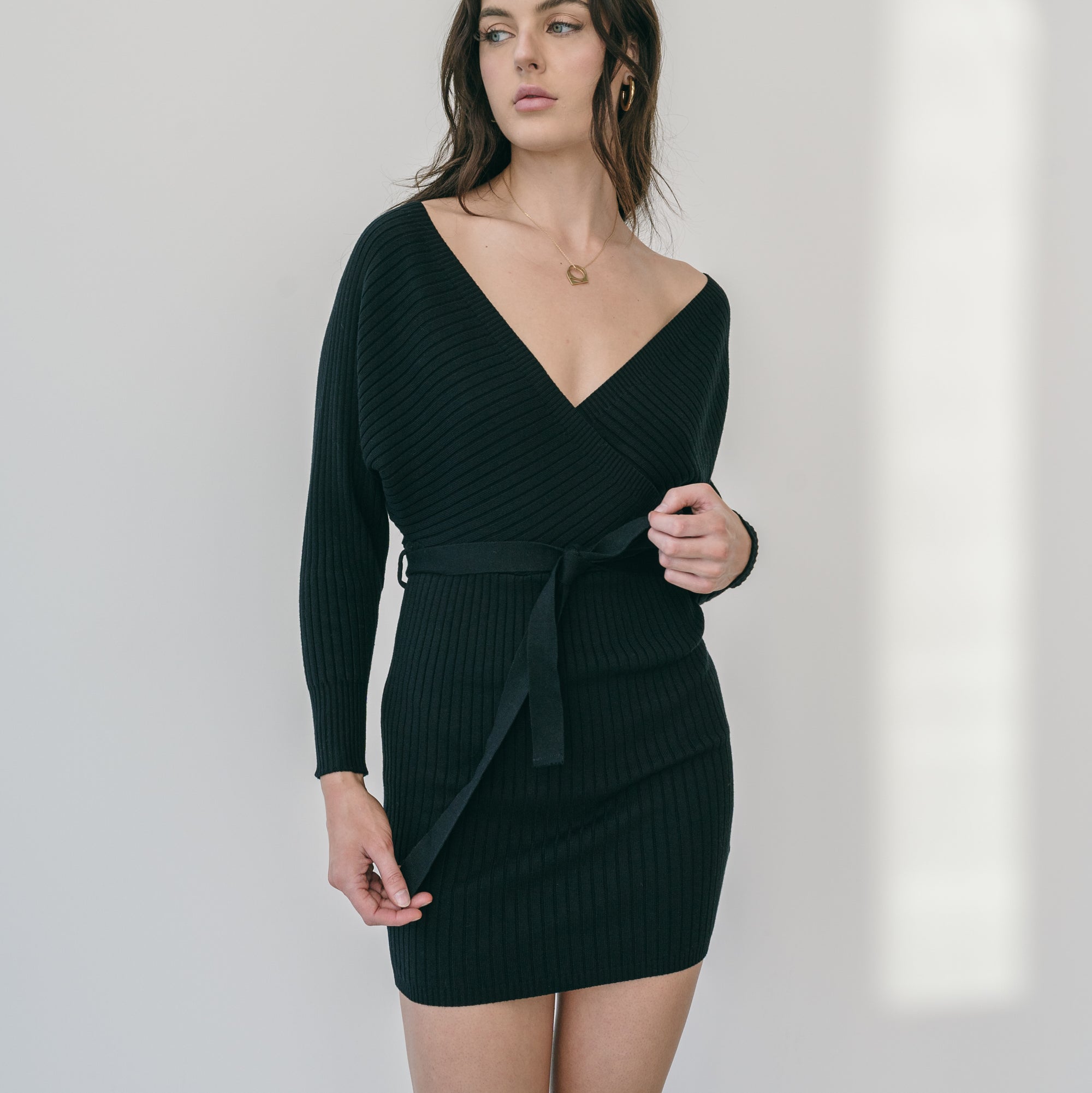 Crossover Short Sweater Dress Ribbed With Belt in Black | OKAKIE Crossover Short Sweater Dress Ribbed With Belt in Black | OKAKIE