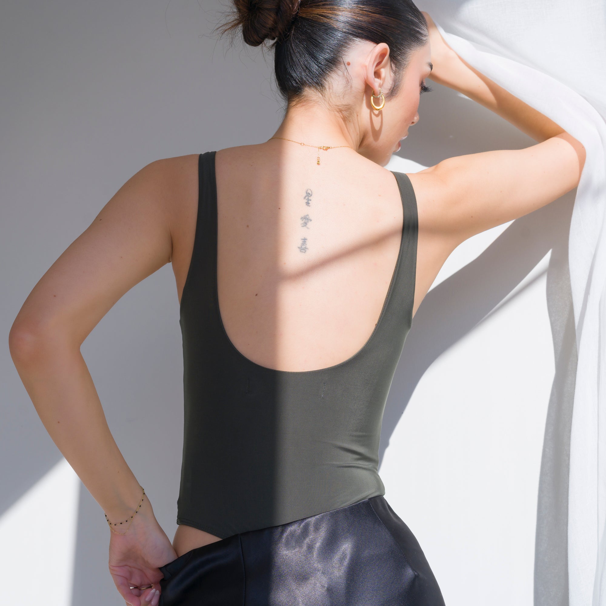 Luxury-Sheen Bodysuit in Stretchy Performance Fabric