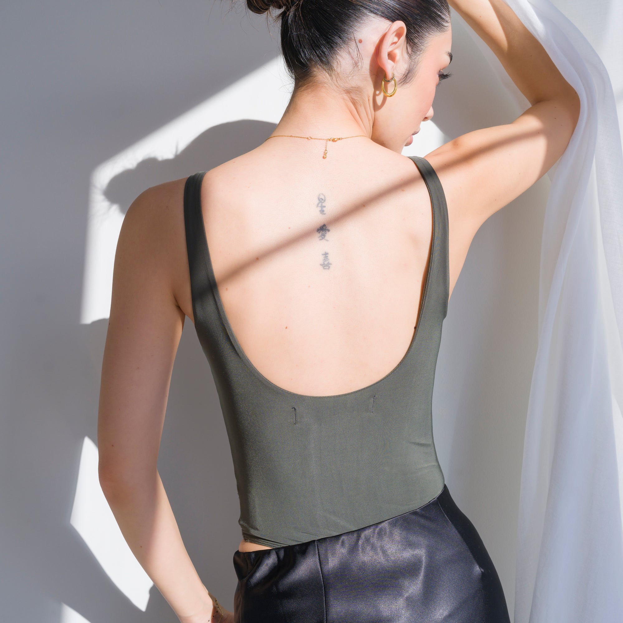 Luxury-Sheen Bodysuit in Stretchy Performance Fabric