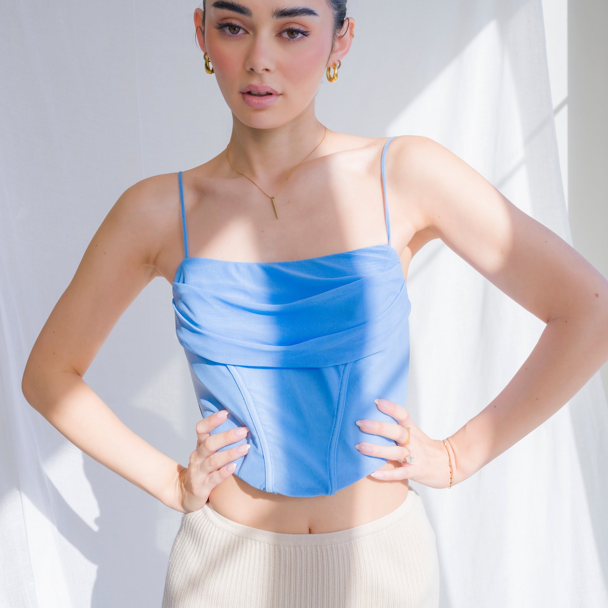 Cowl draped corset in nylon mesh