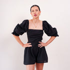THE SÉRA EMBROIDERED EYELET ROMPER