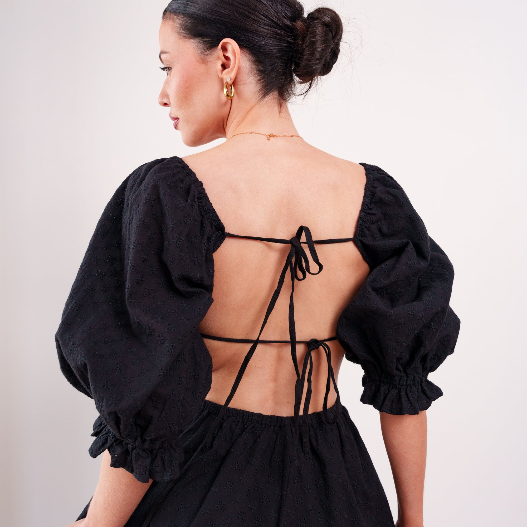 THE SÉRA EMBROIDERED EYELET ROMPER