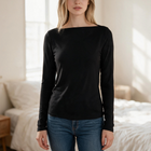 OKAKIE black long-sleeve boat neck top in soft brushed knit with a relaxed fit worn by a model