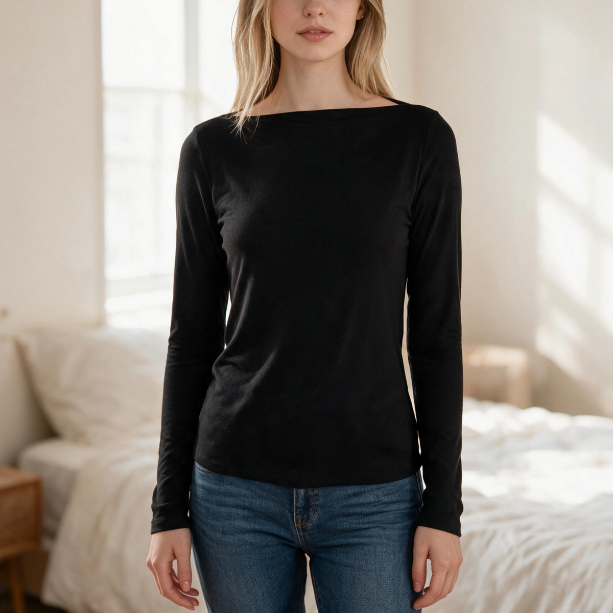 OKAKIE black long-sleeve boat neck top in soft brushed knit with a relaxed fit worn by a model