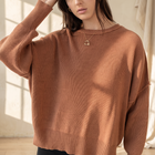 OKAKIE brown oversized boyfriend cotton sweater with drop shoulders, crew neckline, and micro-ribbed knitted texture.