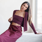 OKAKIE burgundy fuzzy knit tank and bolero set worn by a woman with long hair sitting near a window
