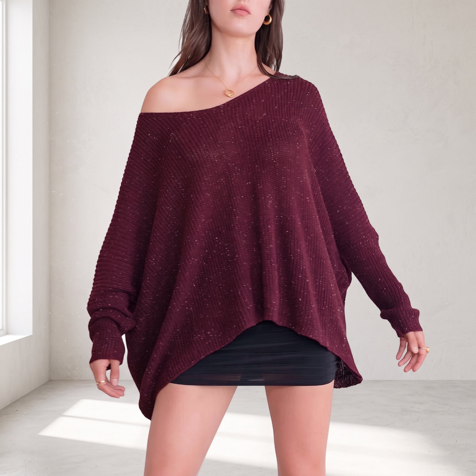 OKAKIE burgundy heavy cotton tunic with a wide V-neck, drop shoulders, and a speckled purl knit texture.