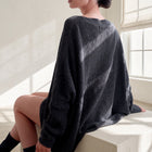 OKAKIE heavy cotton tunic in charcoal with a purl knitted texture, wide V-neck, and loose drop-shoulder fit.