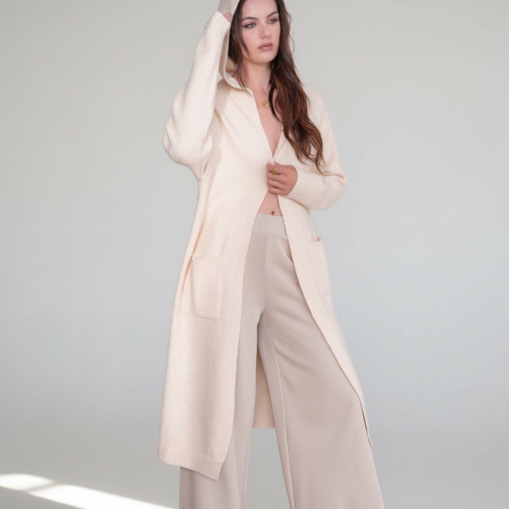 OKAKIE cream hooded maxi cardigan in a thick purl knit with oversized patch pockets worn by a model