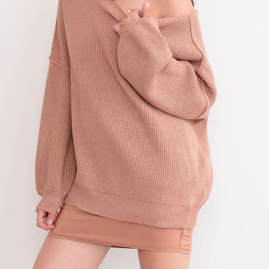 OKAKIE oversized cream ribbed knit tunic sweater with dropped shoulders and a wide neckline worn off the shoulder