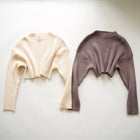 OKAKIE Elodie heavy ribbed knit cropped sweaters in cream and taupe with drop shoulders and high necklines.