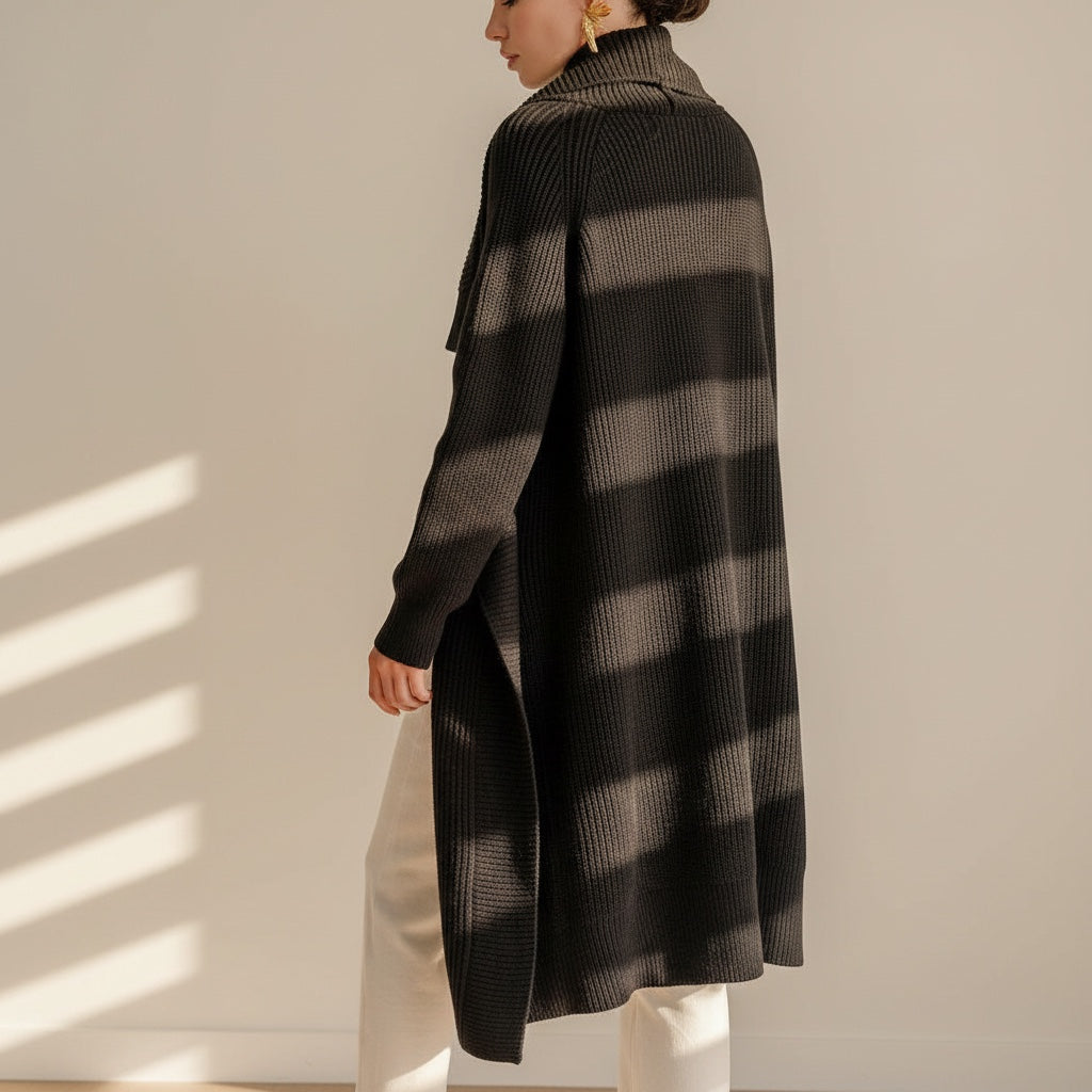 OKAKIE oversized black purl knit coatigan with drop shoulders and knee-length fit worn by a model