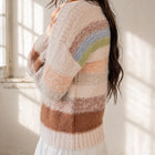 OKAKIE pastel striped sweater with high-pile texture, drop shoulders, and soft knitted finish on a model