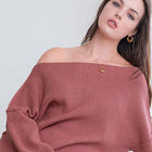 OKAKIE oversized ribbed knit tunic sweater in a dusty rose shade with a wide neckline worn off the shoulder