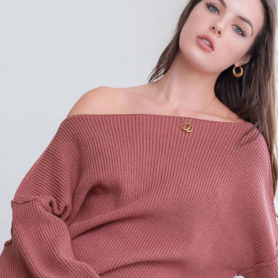 OKAKIE oversized ribbed knit tunic sweater in a dusty rose shade with a wide neckline worn off the shoulder