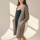 OKAKIE medium weight cable knit cardigan in taupe with oversized patch pockets and drop shoulder sleeves.