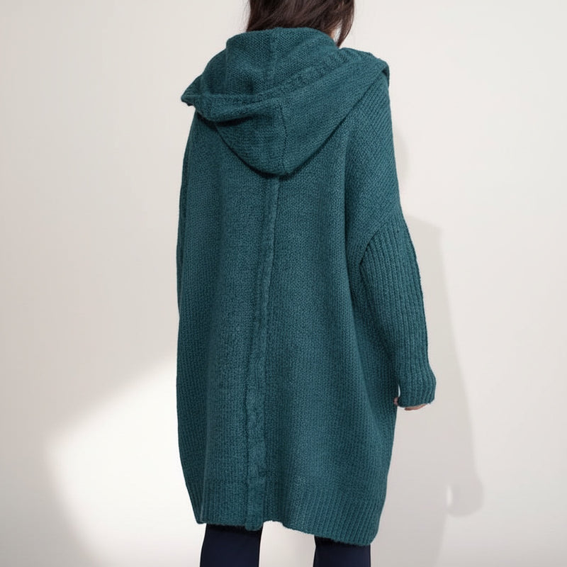 OKAKIE teal fuzzy hooded cardigan with a center back seam and oversized fit, shown from the back.