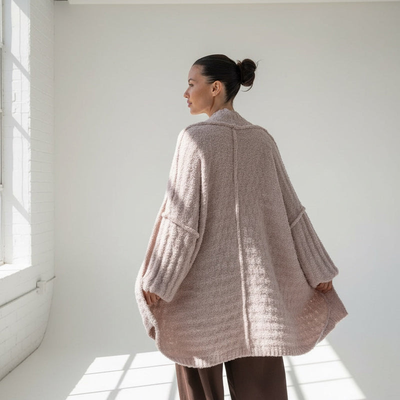 OKAKIE teddy soft cocoon cardigan in a dusty pink cotton blend with oversized sleeves and a relaxed draped fit.