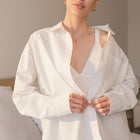 OKAKIE white cotton poplin boyfriend over-shirt with tailored collar and button-up front worn over a ribbed tank top