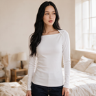 OKAKIE white square neck long sleeve rib knit top worn by a woman in a bright bedroom