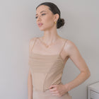 Cowl draped corset in nylon mesh
